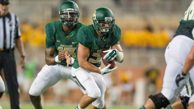 Once homeless and declared ineligible to play college football, Silas Nacita keeps his dream of going pro alive